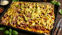 Maxi frittella di patate al forno in teglia: carne, verdure e crosta dorata